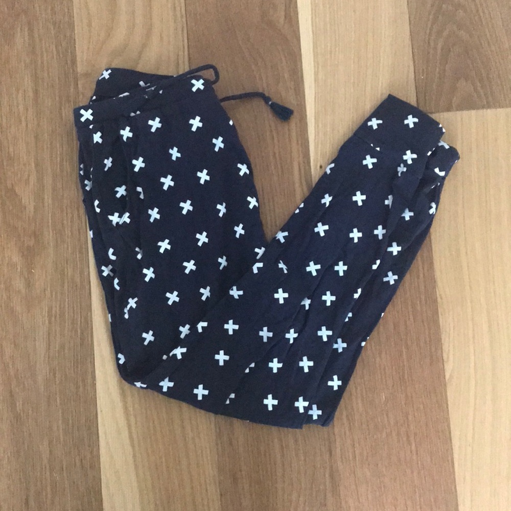 Navy joggers with white cross pattern